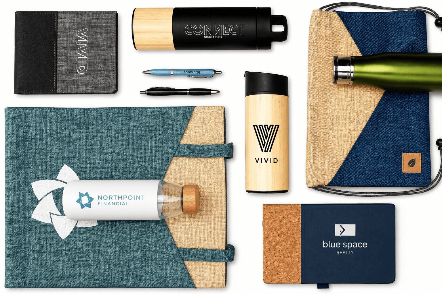Custom branded swag items including a notebook, bamboo tumbler, reusable water bottle, eco-friendly tote bag, drawstring bag, pen, and journal.