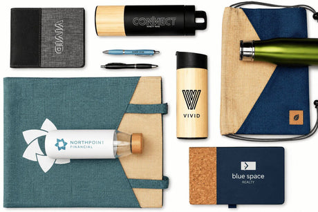 Custom branded swag items including a notebook, bamboo tumbler, reusable water bottle, eco-friendly tote bag, drawstring bag, pen, and journal.