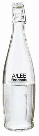 Water 33oz bottle clear glass with white wire lid